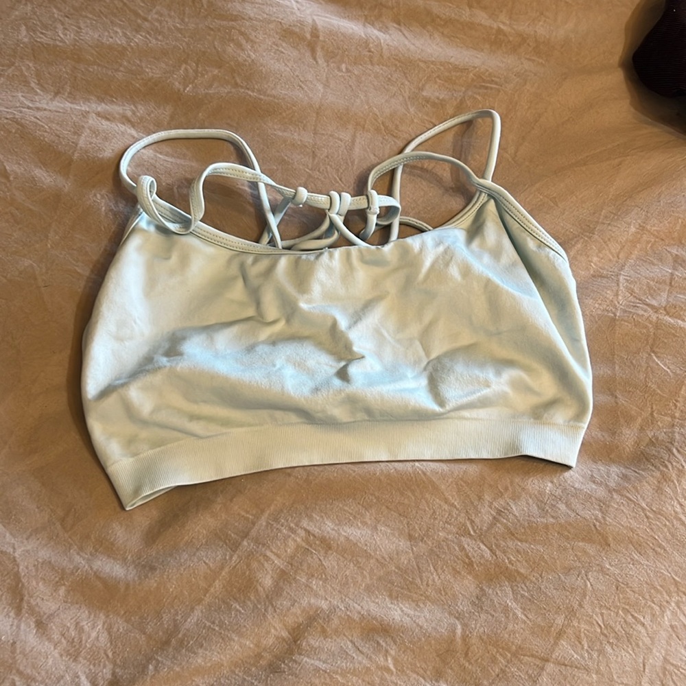 Blue fabletics strappy sports bra. Size Medium.